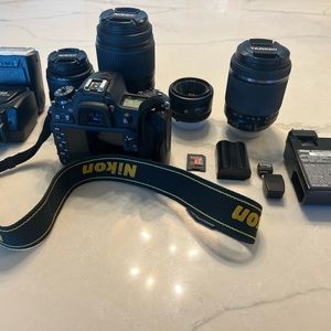 Nikon D7100 camera, 4 lenses, Flash, battery, charger and Wi-FI connector